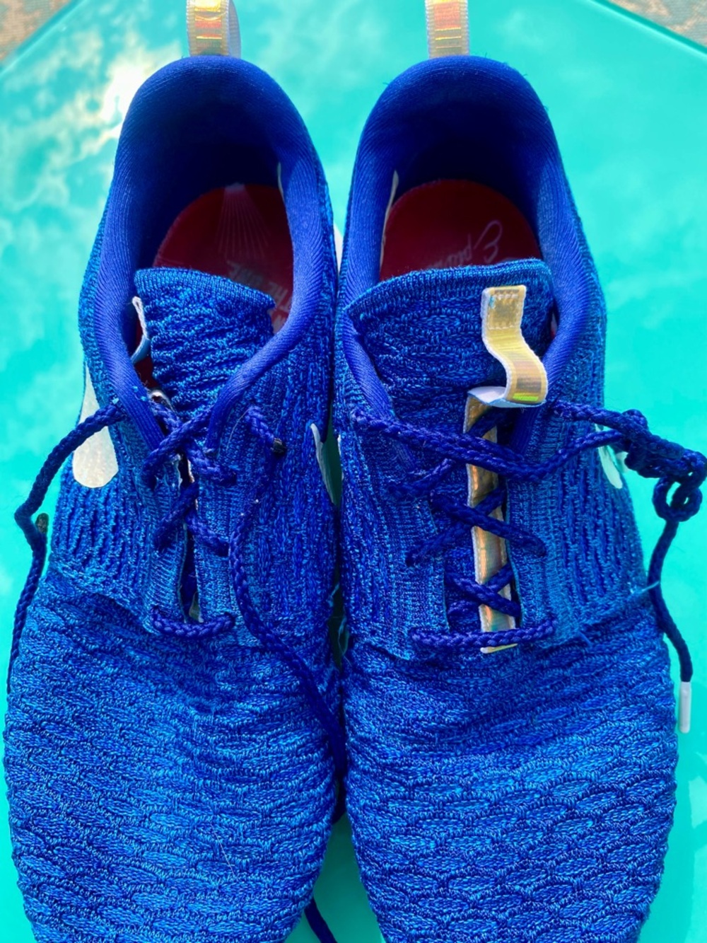 Nike Men’s Flyknit Athletic Sneakers - Blue with White Accents - Picture 5 of 6